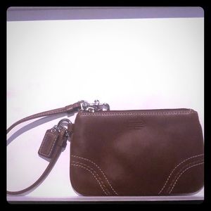 Small Coach wristlet in brown